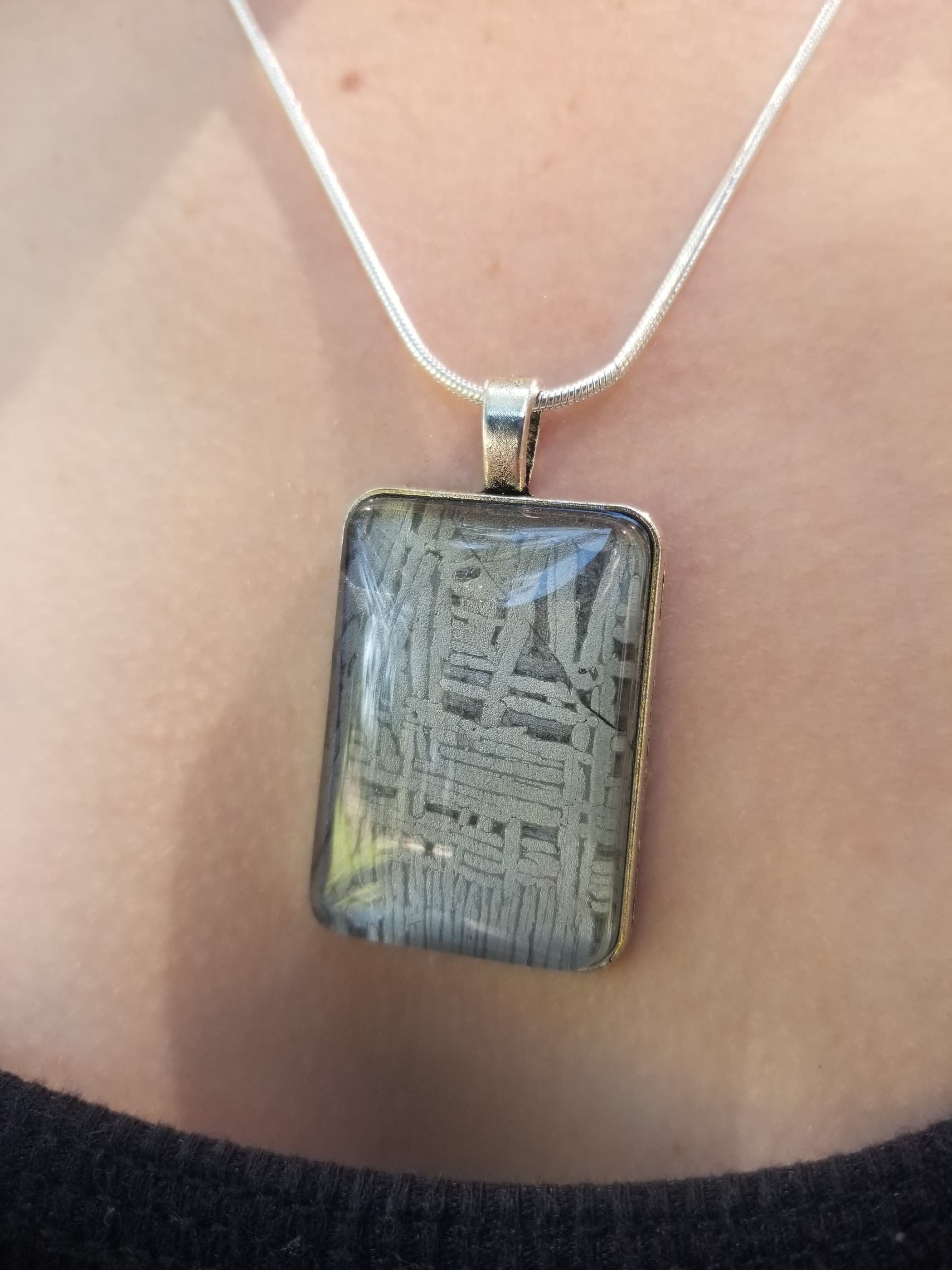 Unique Aletai Meteorite Sphere Presented in Sterling Silver Angel Wings Pendant - Widmanstätten Pattern