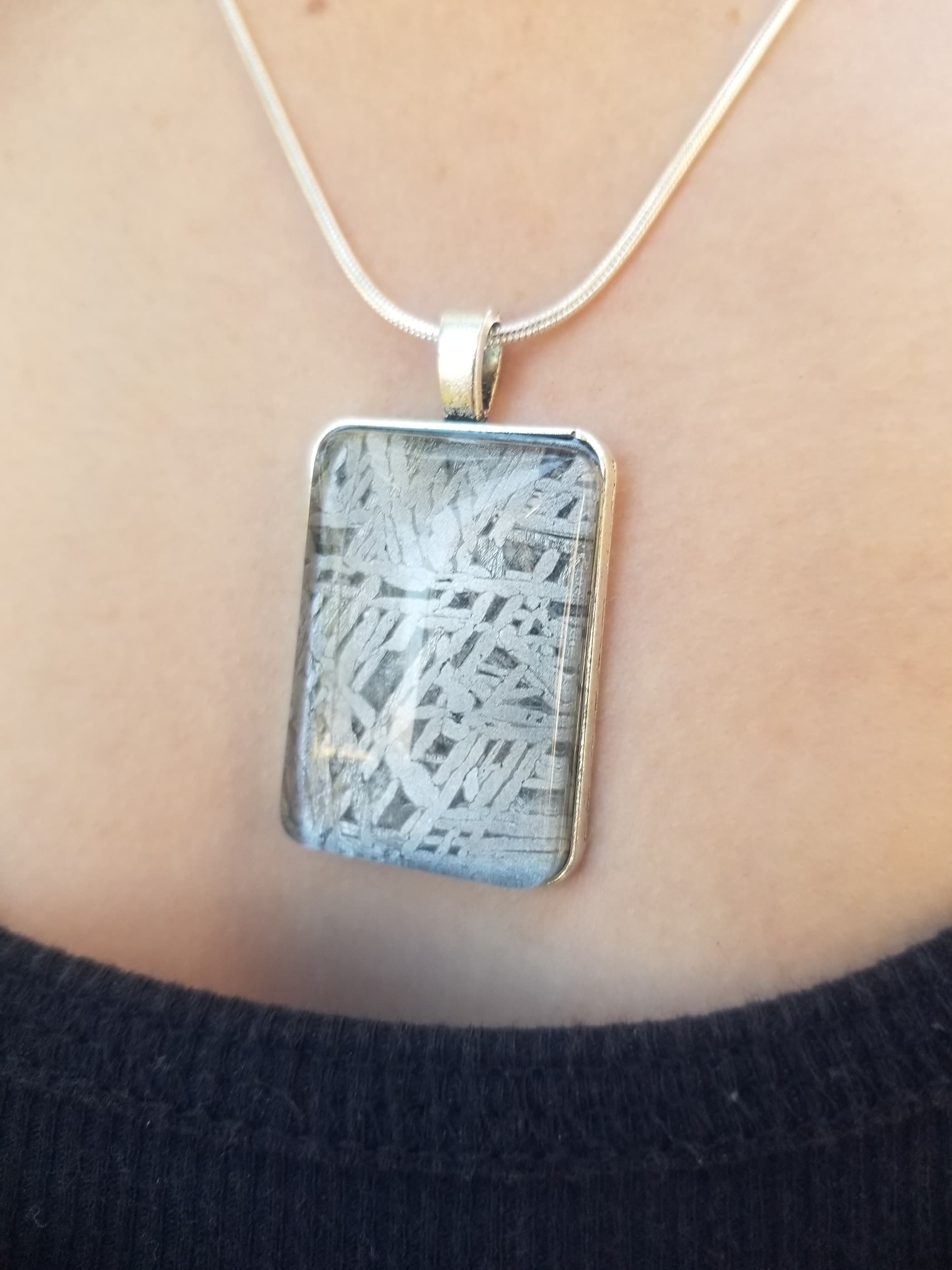 Unique Aletai Meteorite Sphere Presented in Sterling Silver Angel Wings Pendant - Widmanstätten Pattern