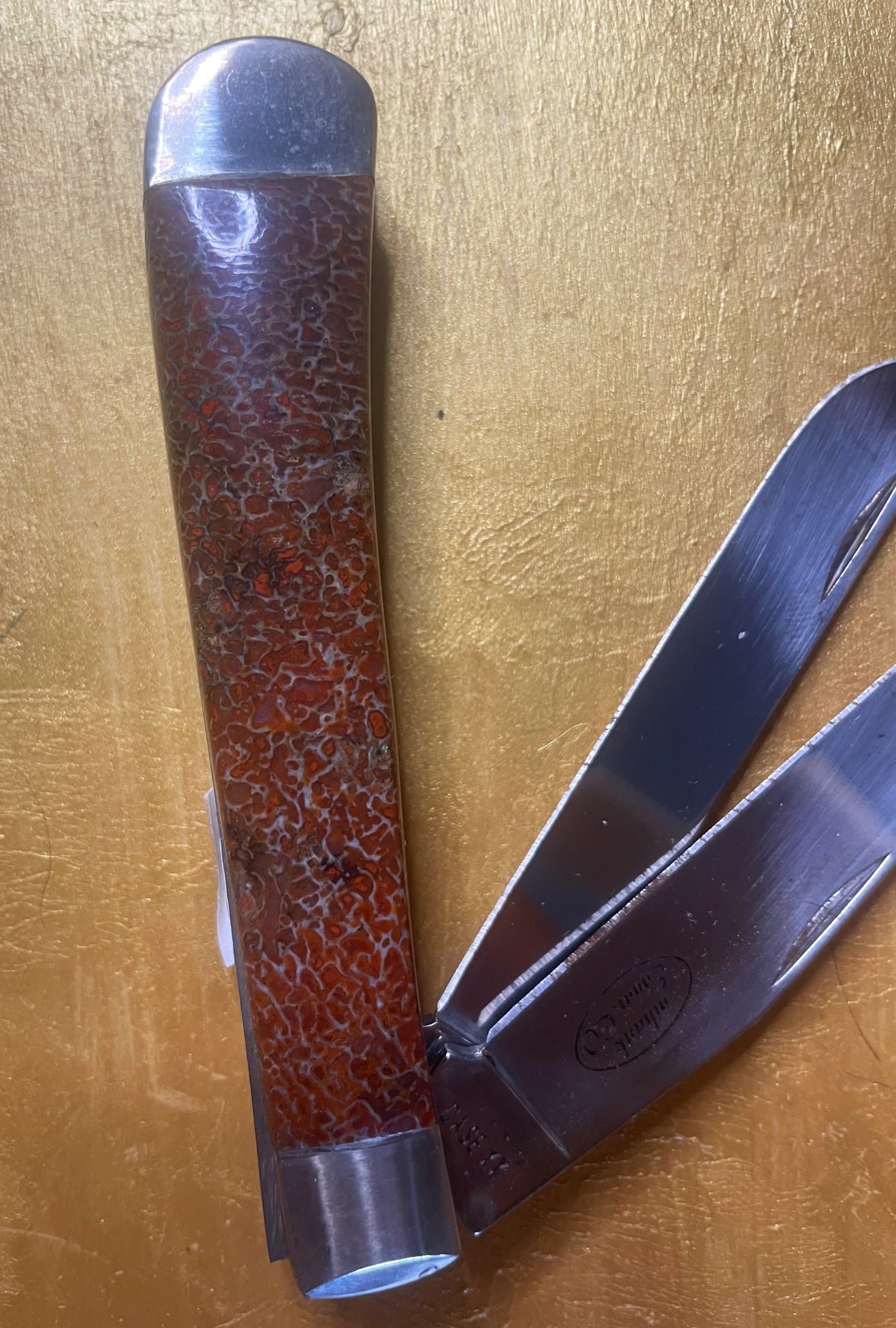 Nice Red Dinosaur Gem Bone Handle Folding Utility Knife - 4” Handle